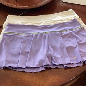 Two nike tennis skirts..dri fit size xl